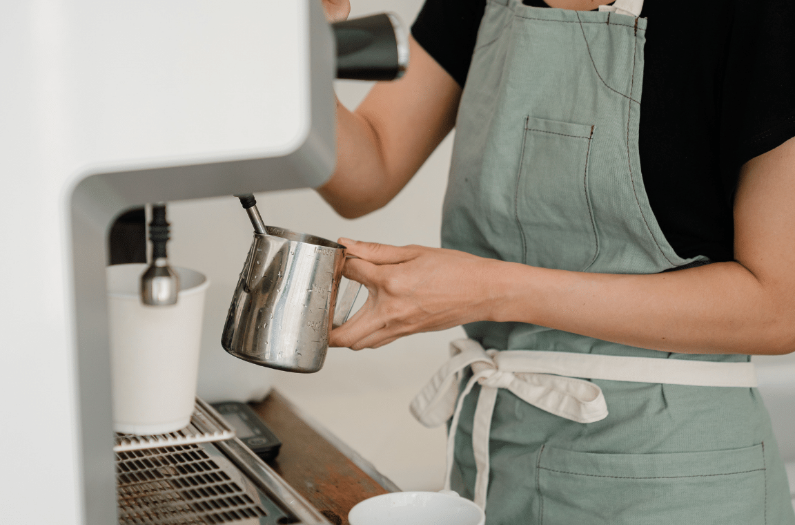 barista making a coffee - Annualised Wage Provisions For Restaurant and Hospitality Awards